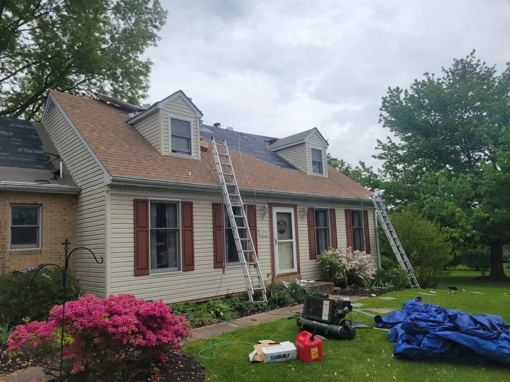 Slide of Scheurich Roofing