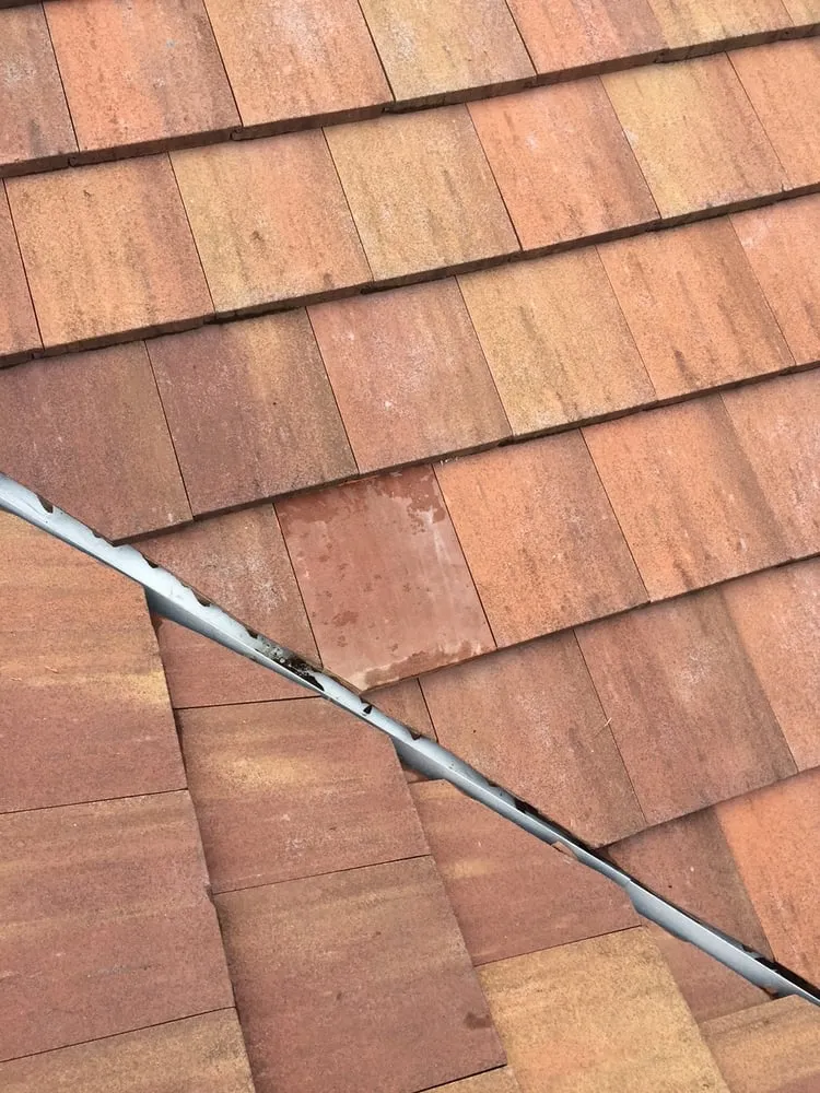 Slide of Schick Roofing