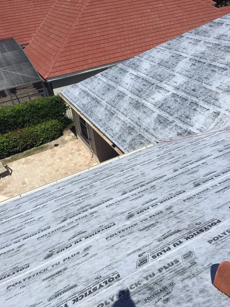 Slide of Schick Roofing