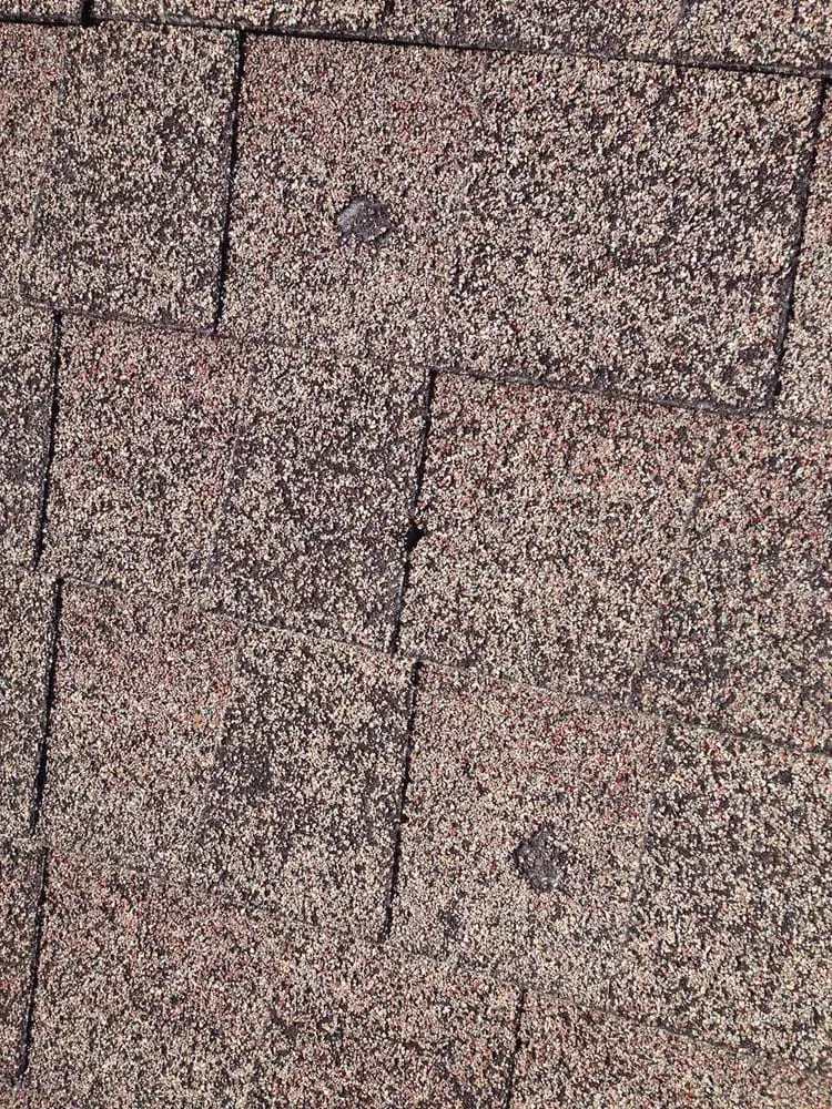 Slide of Schick Roofing