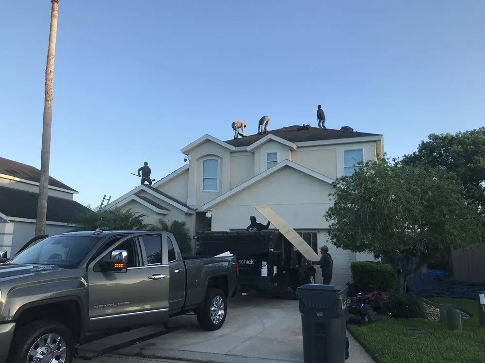 Slide of Schick Roofing