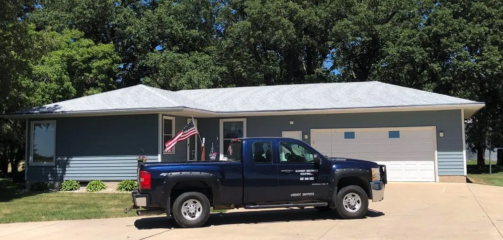 Slide of Schmidt Brothers Roofing