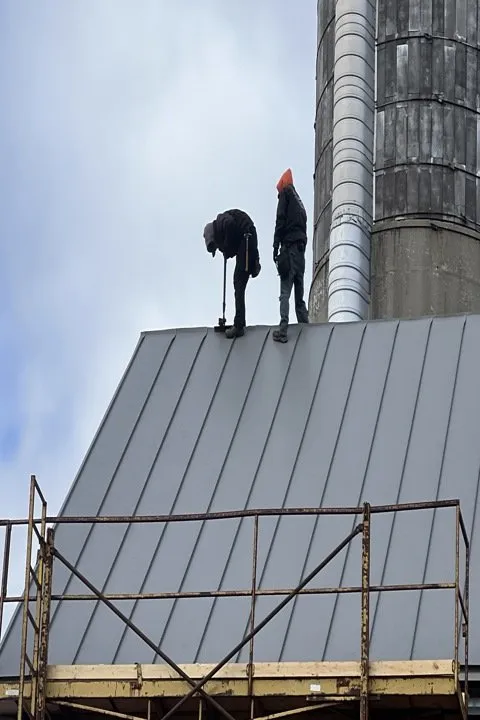 Slide of Schoenecker Steel Roofing