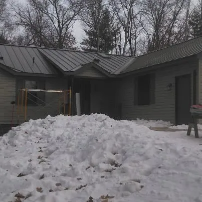 Slide of Schoenecker Steel Roofing