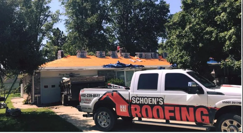 Slide of Schoen's Roofing