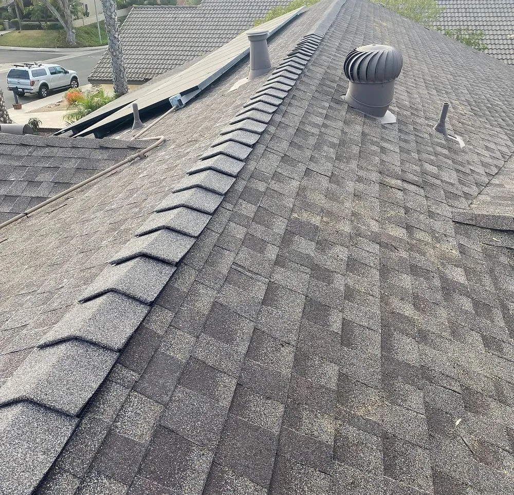 Slide of Schott Roofing