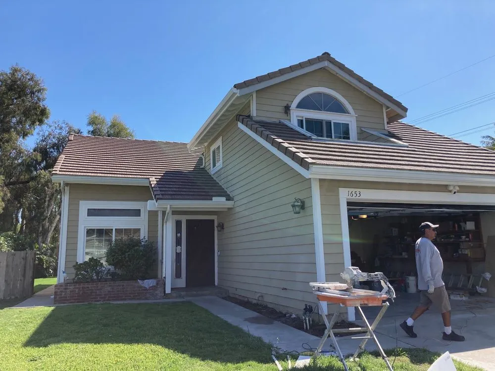 Slide of Schott Roofing