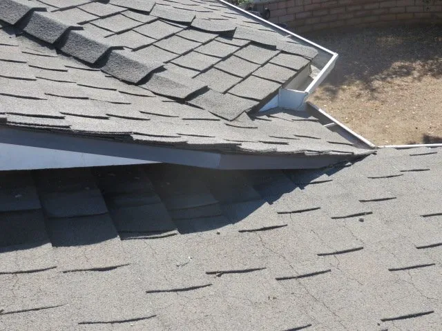 Slide of Schott Roofing