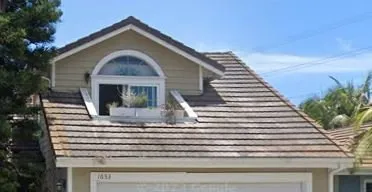 Slide of Schott Roofing