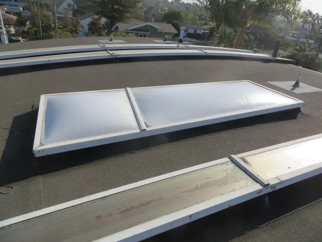 Slide of Schott Roofing