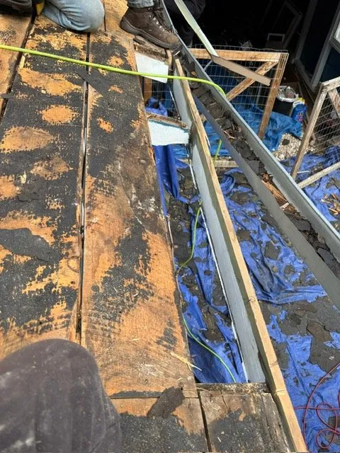 Slide of Schultz Roofing Company