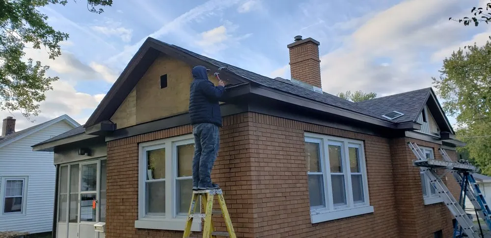 Slide of Schwarz Guttering & Roofing