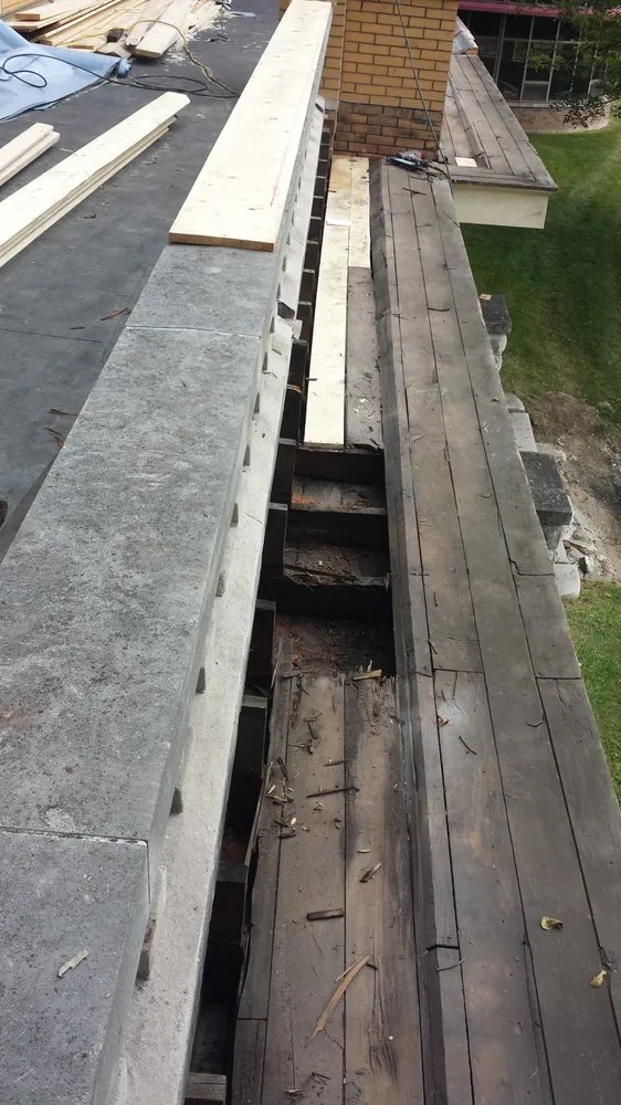 Slide of Schwarz Guttering & Roofing