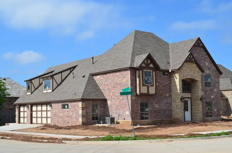 Slide of ScissorTail Roofing and Construction