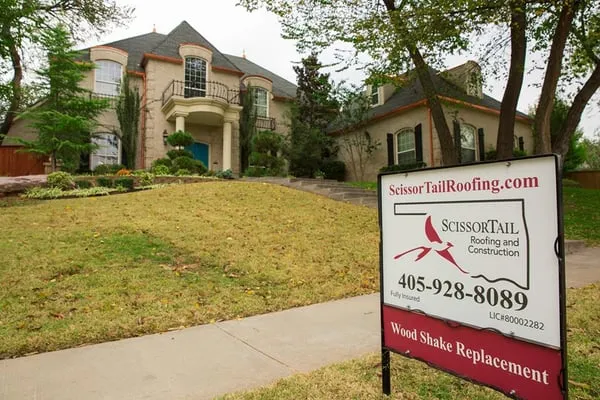 ScissorTail Roofing and Construction Logo