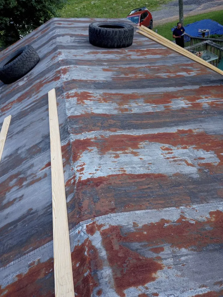 Top-rated residential roofing service in War, WV by Scotties Roofing