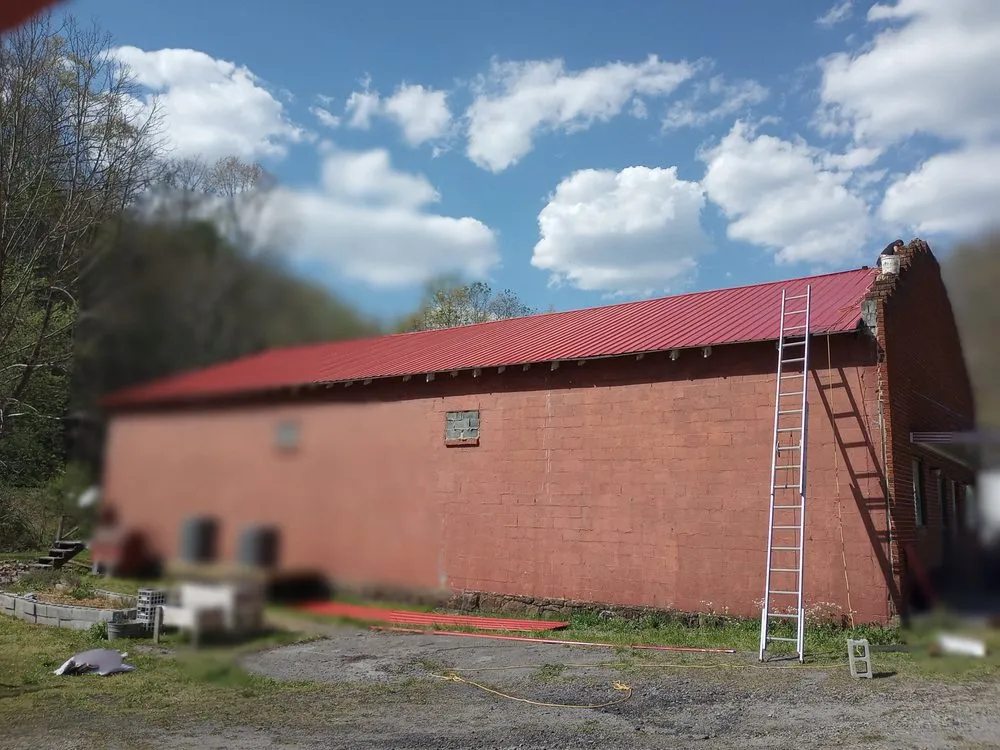 Licensed flat roof repair for fast service in War, WV by Scotties Roofing
