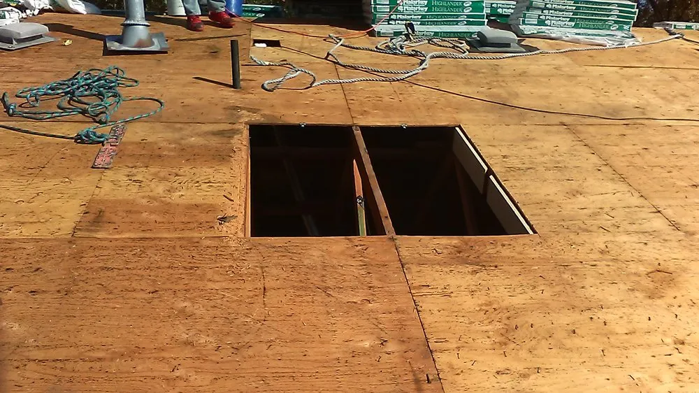 Slide of Scotty's Gutters & Roofing Pros