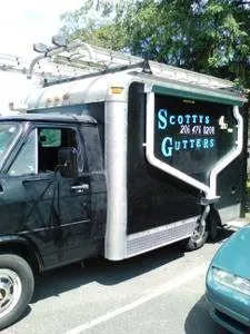Slide of Scotty's Gutters & Roofing Pros