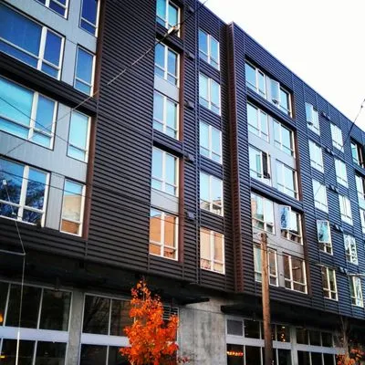 Scotty's Gutters & Roofing Pros Logo