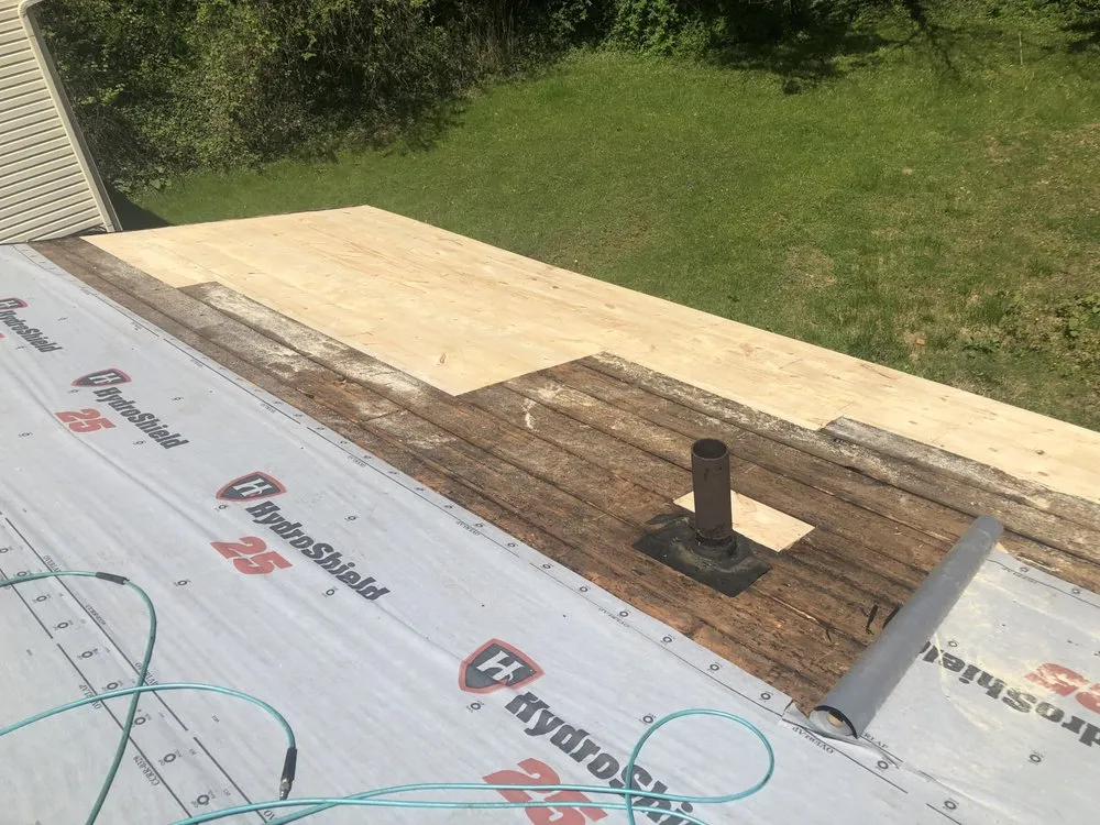 Slide of Scotty’s Roofing & Repair Service