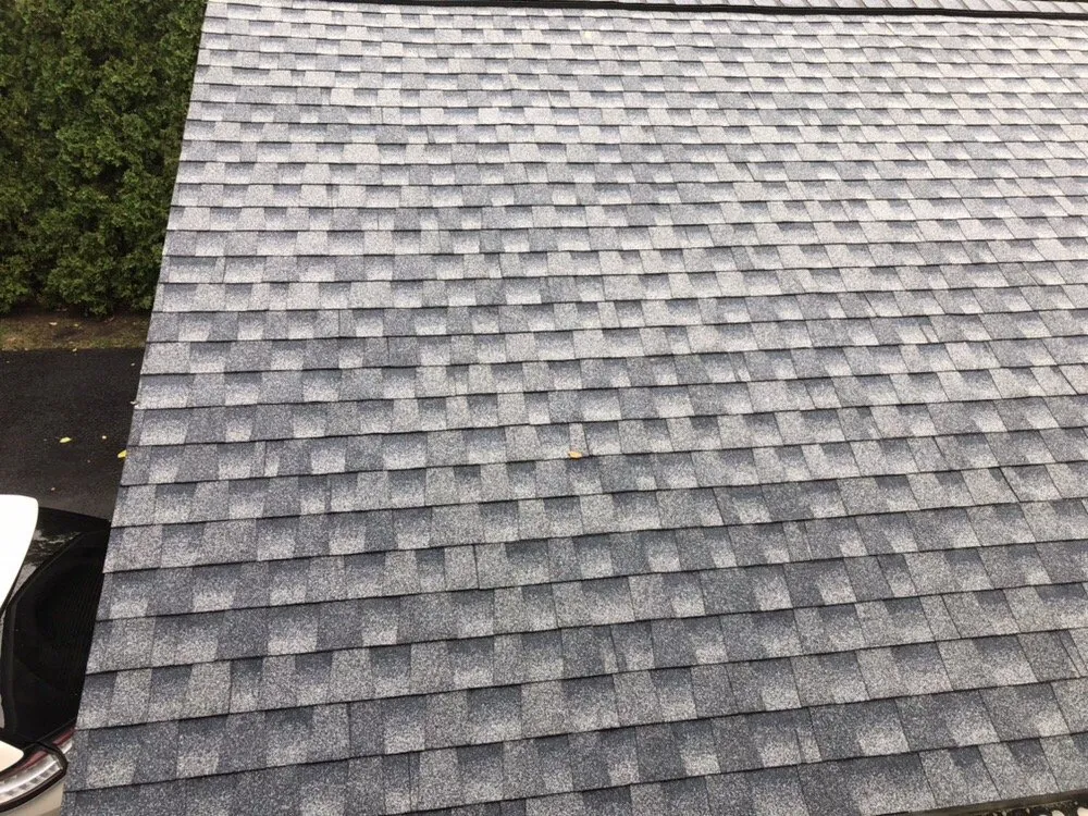 Slide of SE-ME Roofing