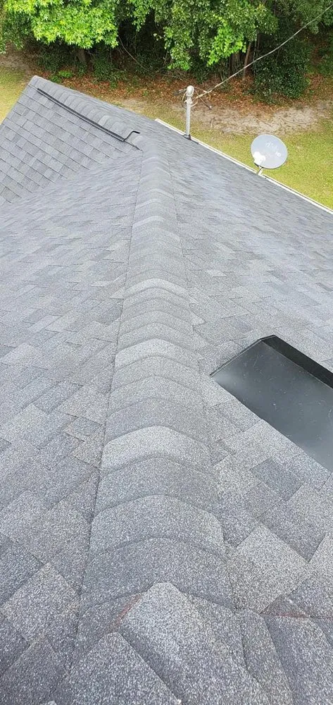 Slide of SE Roofing and Construction