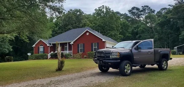 SE Roofing and Construction Logo
