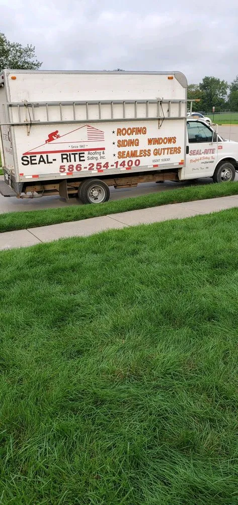 Emergency storm damage roof repair in Shelby Twp, MI by Seal-Rite Roofing & Siding