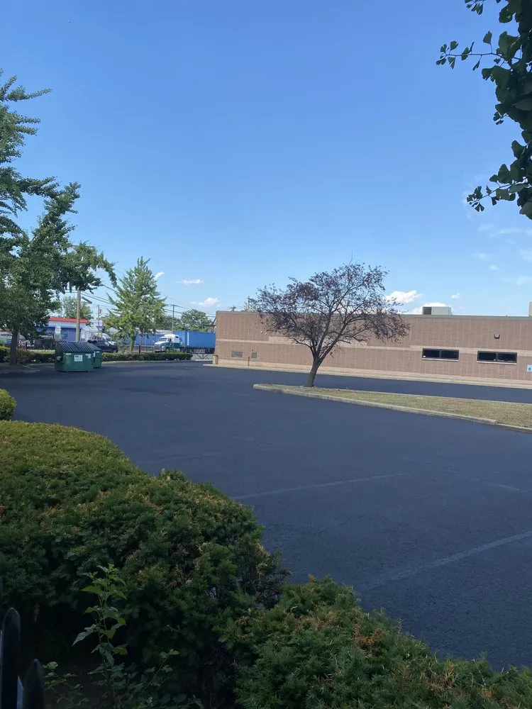 Slide of Seal-Rite Sealcoating