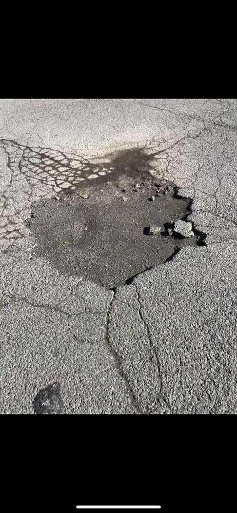 Slide of Seal-Rite Sealcoating