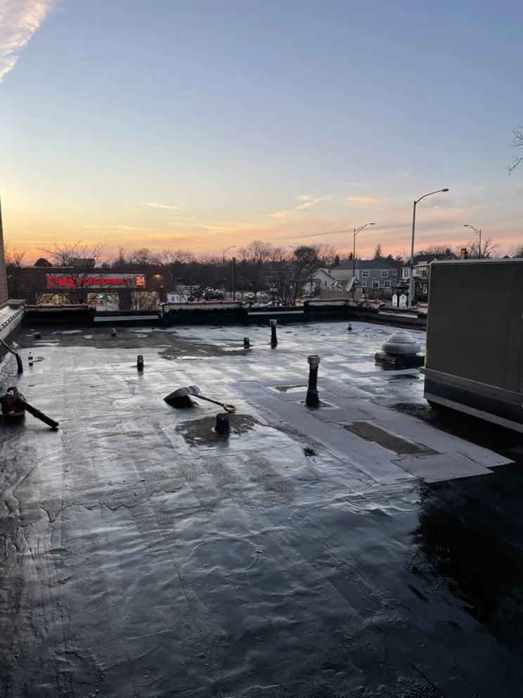 Slide of Sealed Tight Roofing and Paving