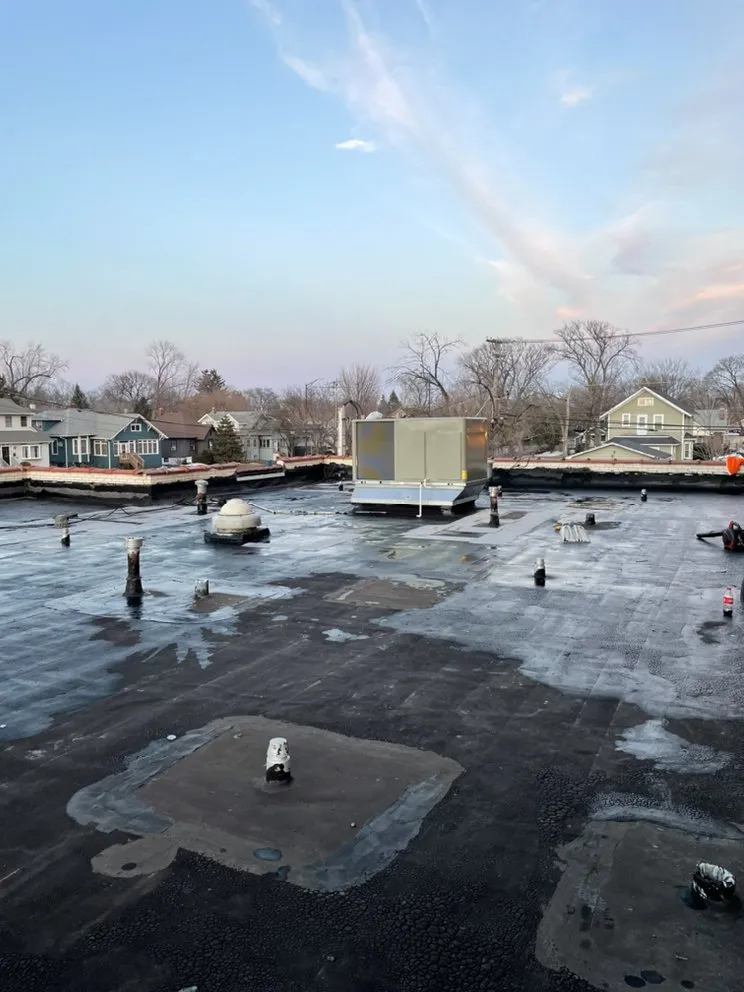 Slide of Sealed Tight Roofing and Paving