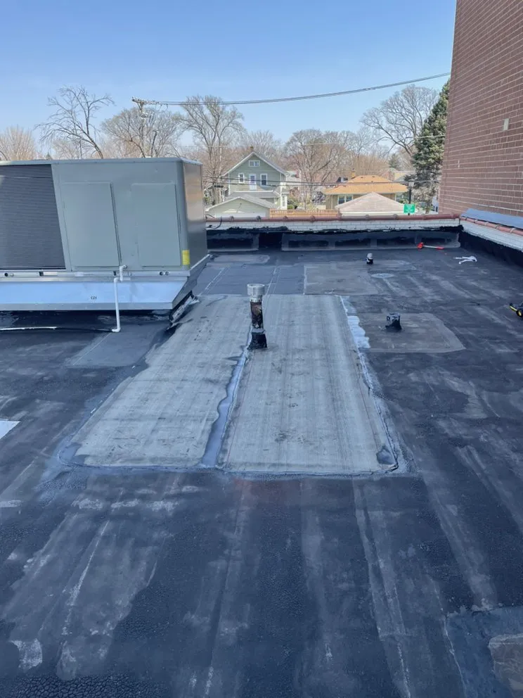 Slide of Sealed Tight Roofing and Paving