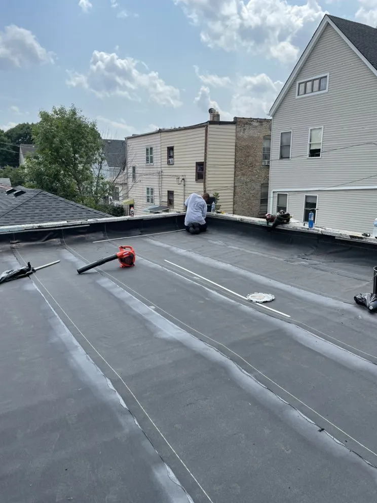 Slide of Sealed Tight Roofing and Paving