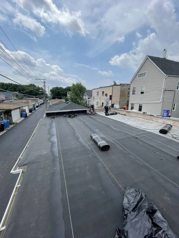 Slide of Sealed Tight Roofing and Paving