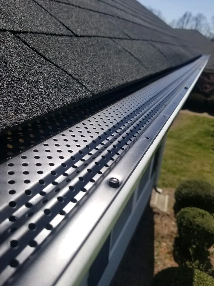 Slide of Seamless Gutter Pros