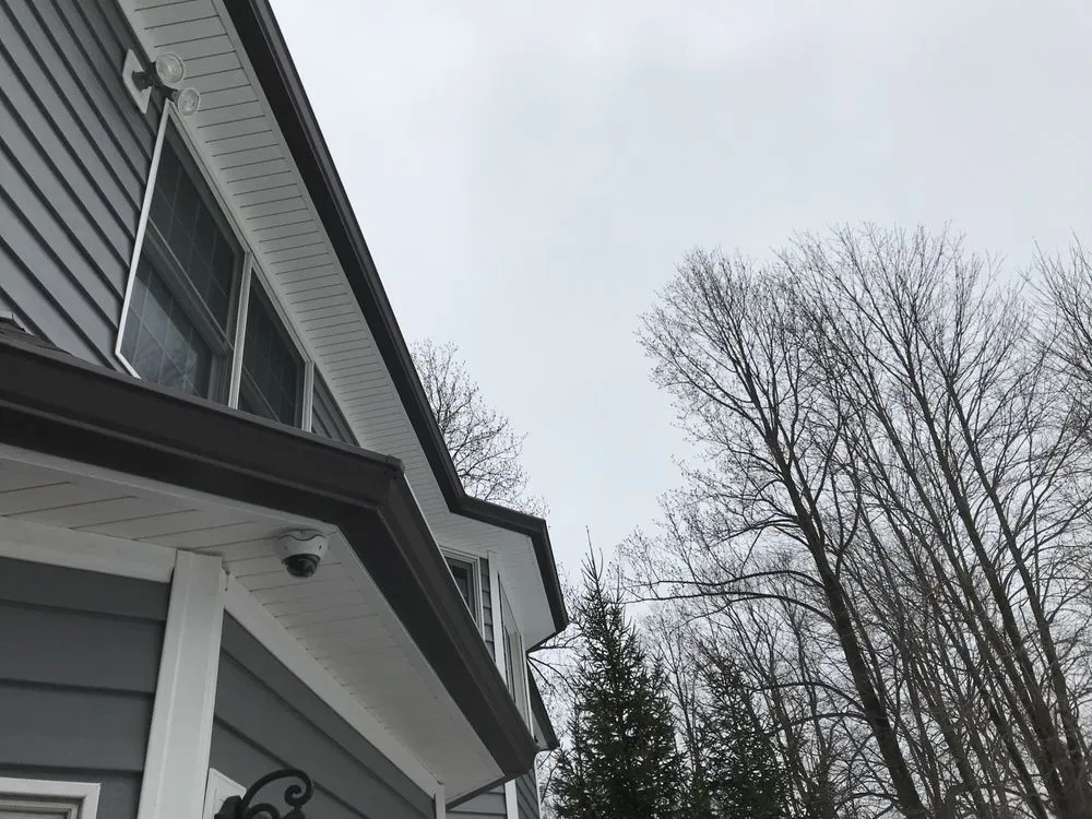 Slide of Seamless Gutter Services