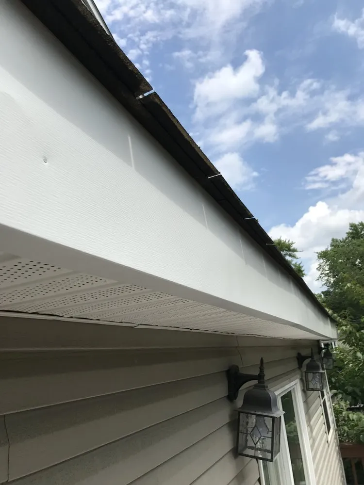 Slide of Seamless Gutter Services