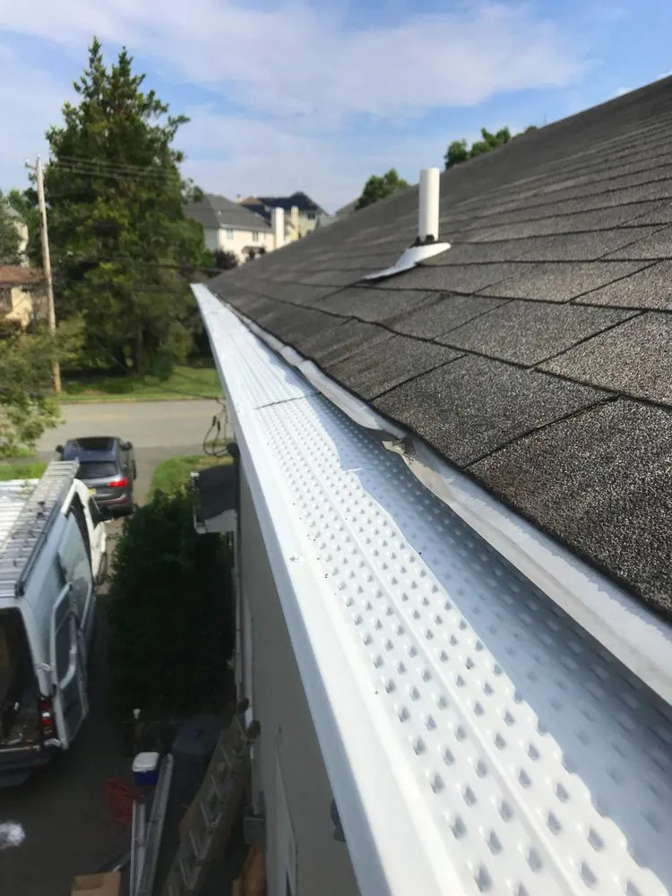 Slide of Seamless Gutter Services
