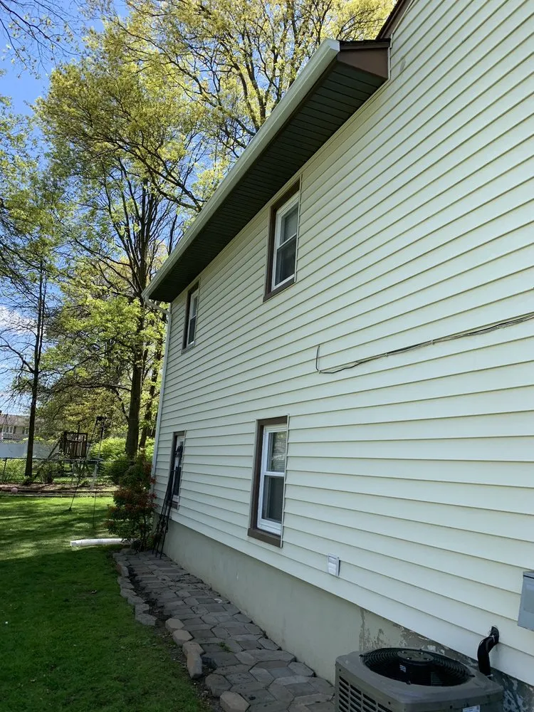 Slide of Seamless Gutter Services