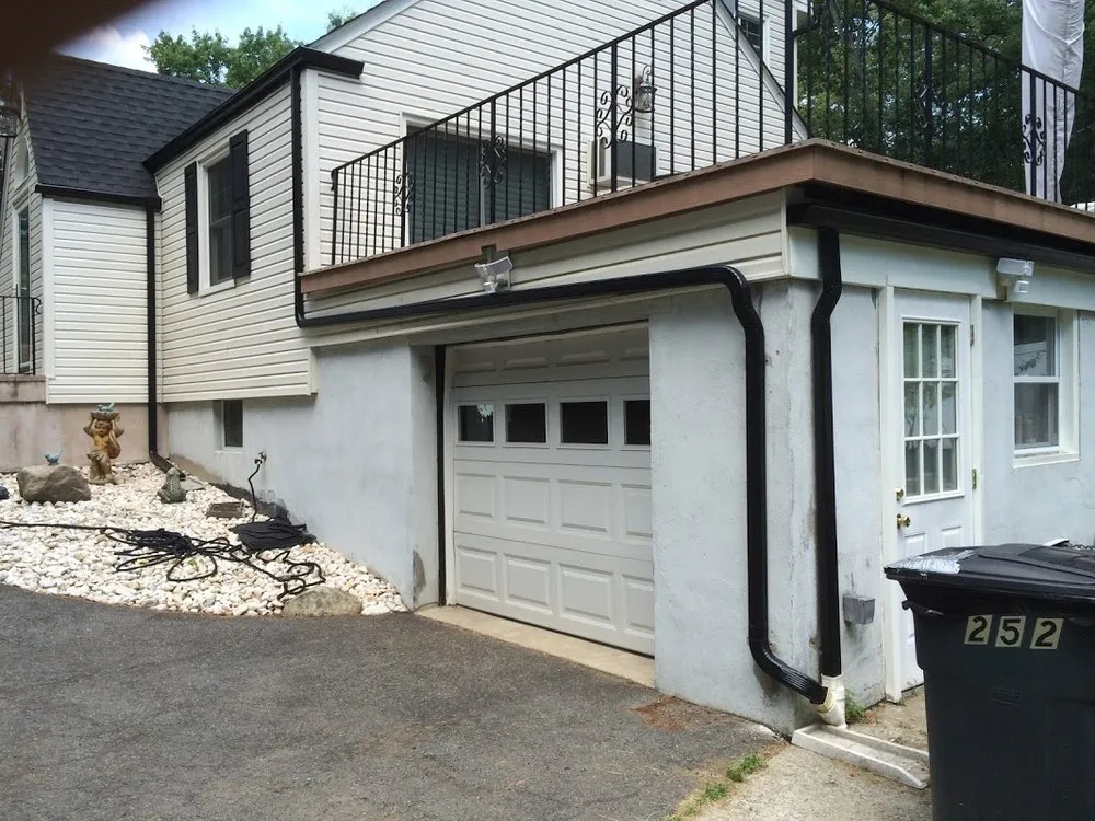 Slide of Seamless Gutter Services