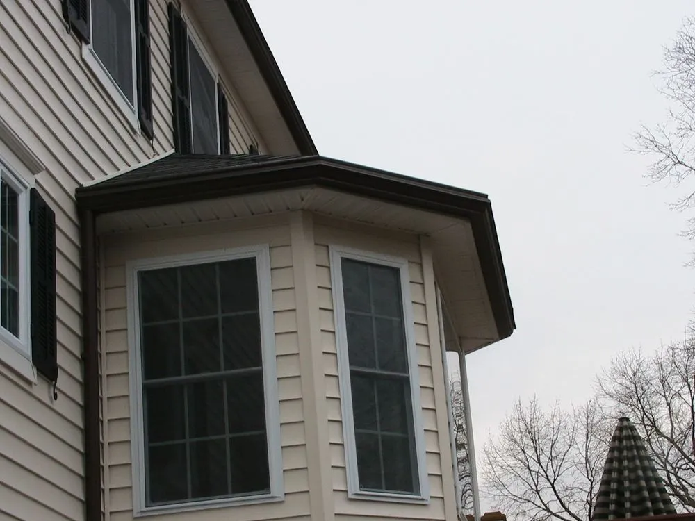 Slide of Seamless Gutter Services