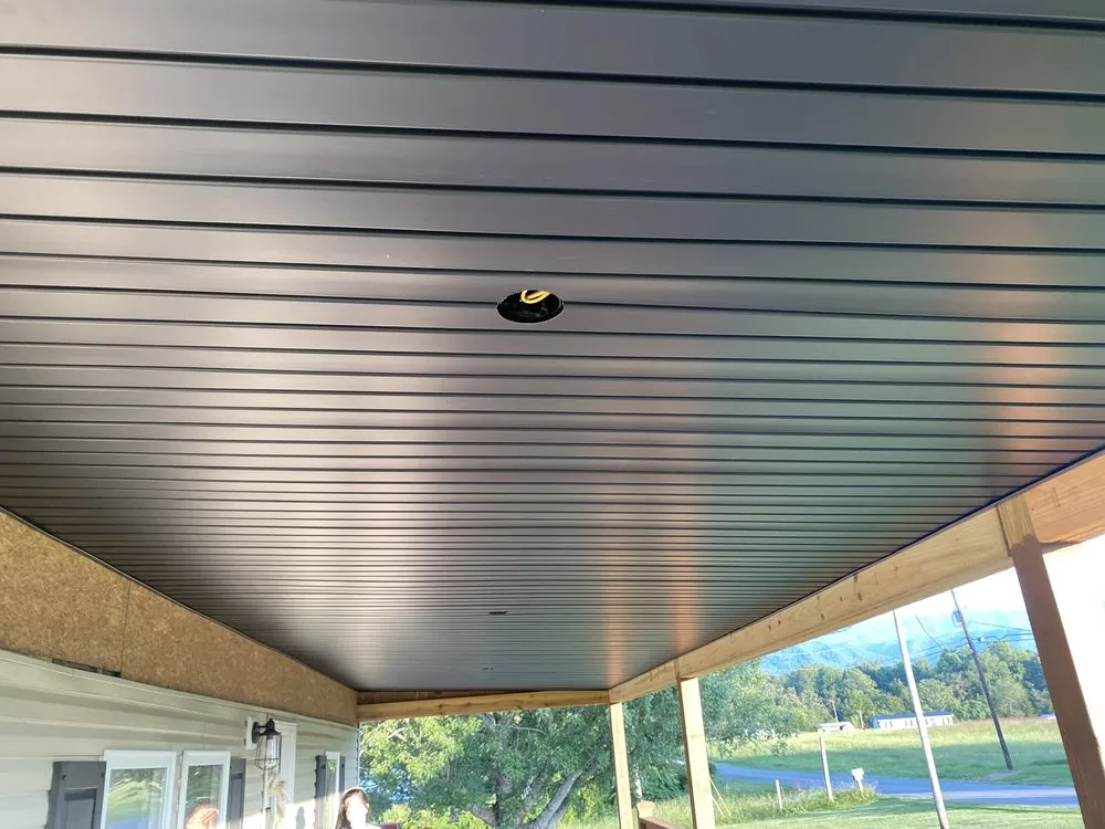 Local storm damage roof repair with free inspection in Afton, TN by Seamless Solutions