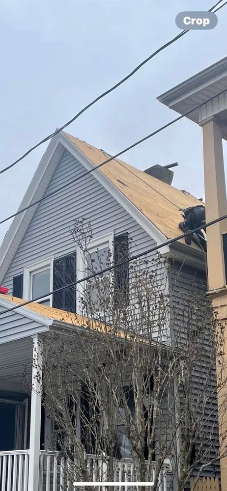 Slide of Seattle’s Roofing Experts