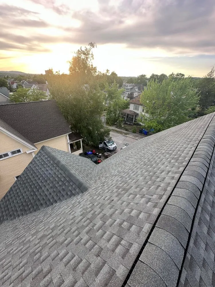 Slide of Seattle’s Roofing Experts