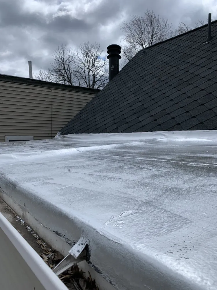 Slide of Second City Flat Roofs