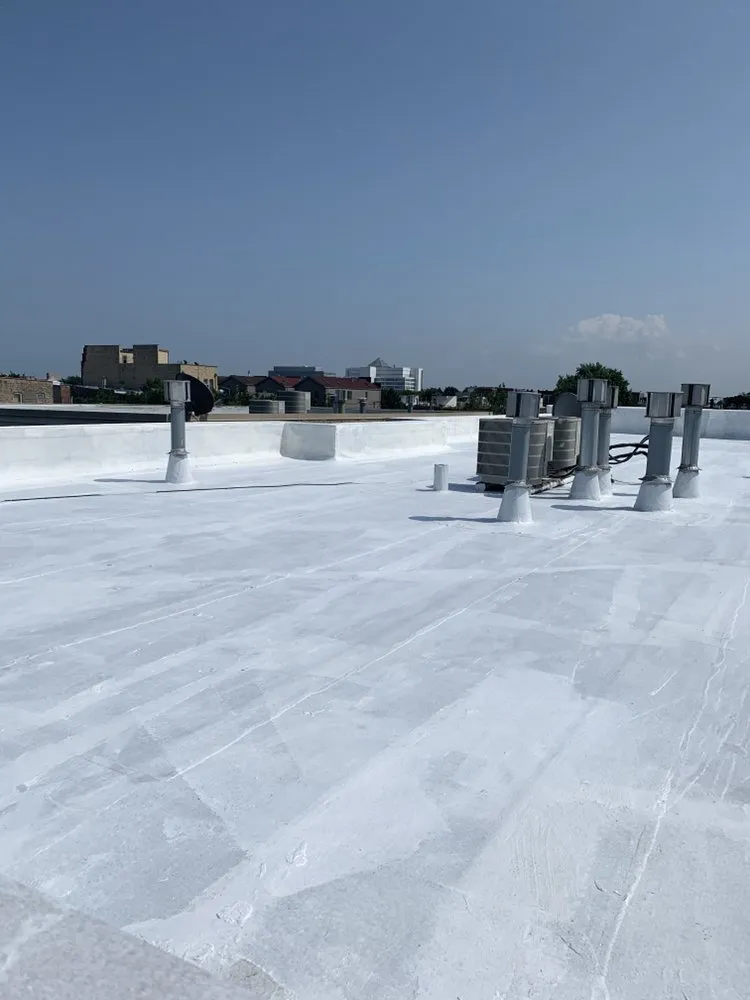 Slide of Second City Flat Roofs