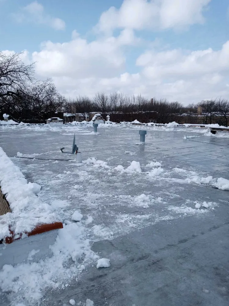 Slide of Second City Flat Roofs