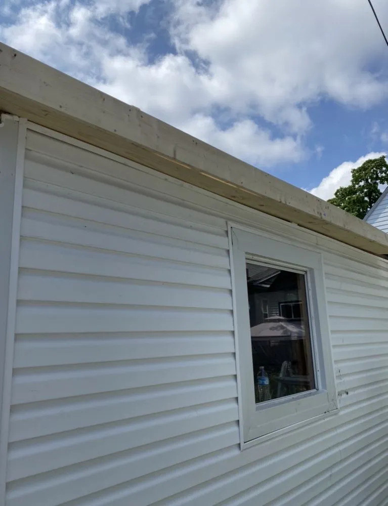 Slide of Second City Flat Roofs